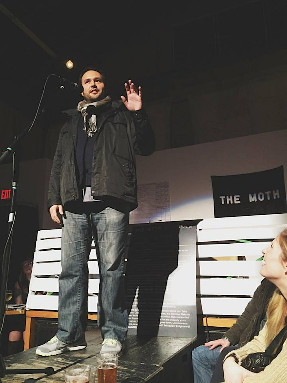 Photo showing Jonas speaking on stage.
