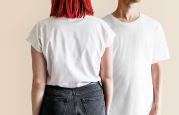 Two people standing in white t-shirts