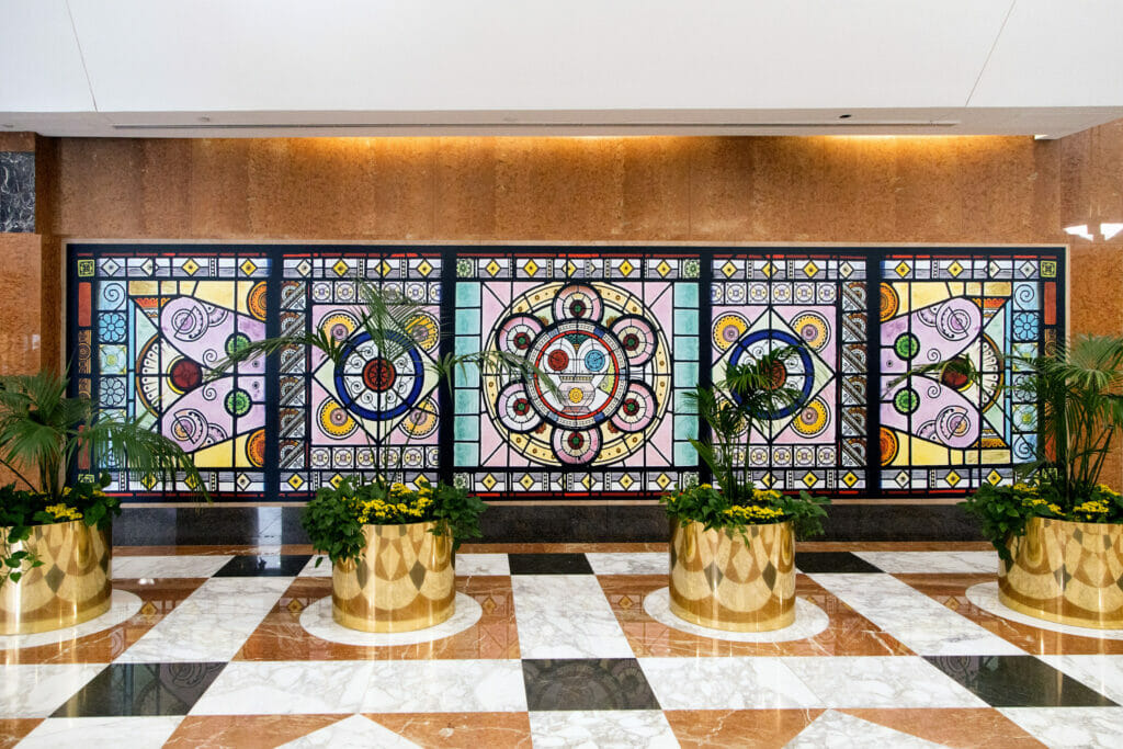 Illumination, 2020. Julia Whitney Barnes created this multifaceted large-scale installation inspired by the 19th century stained glass artist Charles Booth. Presented by Arts Brookfield at One Pierrepont Plaza in Brooklyn. Photo credit: Sean Hemmerle.